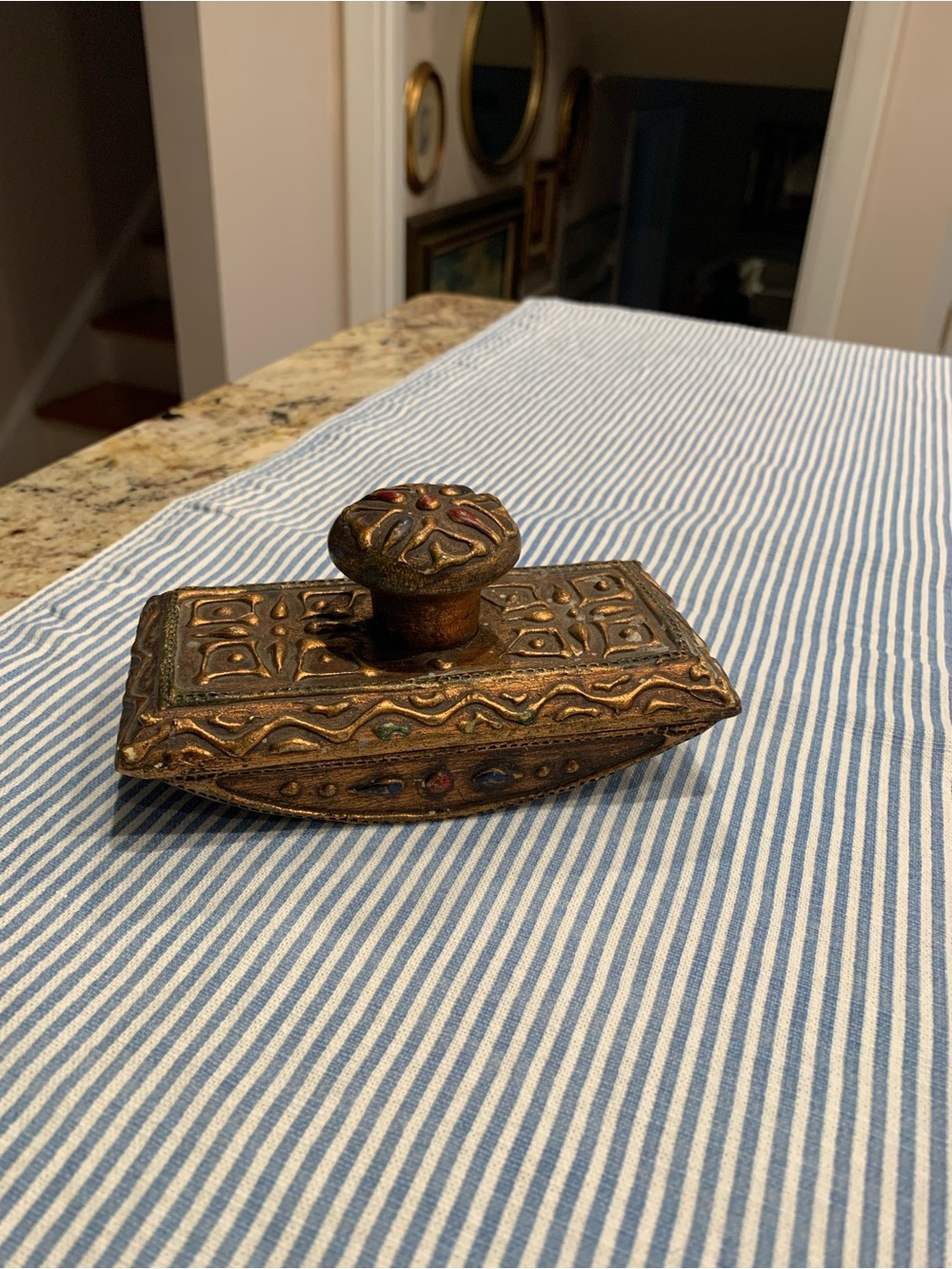 Vintage Florentine rocking ink blotter featuring an engraved top and wooden base